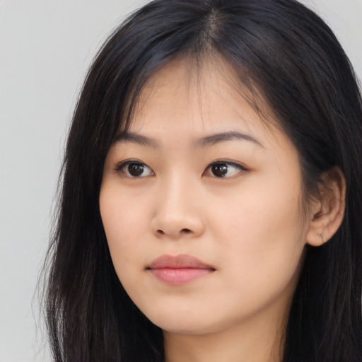 Neutral asian young-adult female with long  black hair and brown eyes