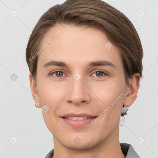 Joyful white young-adult female with short  brown hair and grey eyes