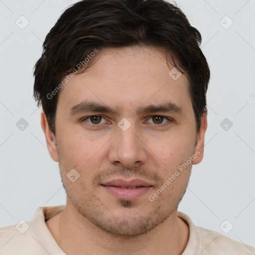 Joyful white young-adult male with short  brown hair and brown eyes