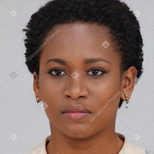 Neutral black young-adult female with short  brown hair and brown eyes