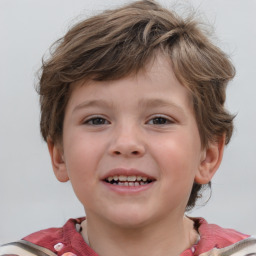 Joyful white child male with short  brown hair and grey eyes