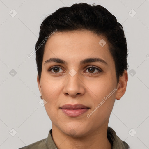 Joyful white young-adult female with short  brown hair and brown eyes