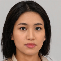 Neutral asian young-adult female with medium  brown hair and brown eyes