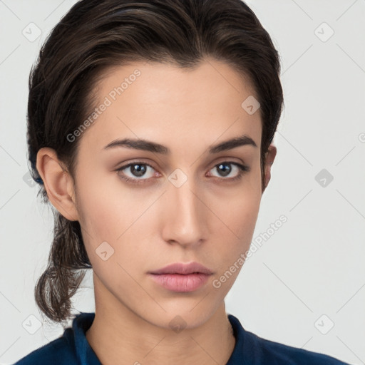 Neutral white young-adult female with medium  brown hair and brown eyes