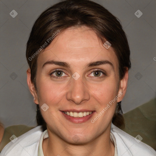 Joyful white adult female with short  brown hair and brown eyes