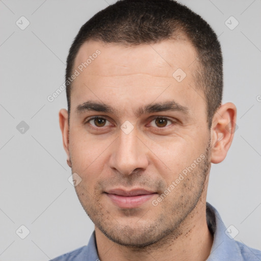 Joyful white young-adult male with short  brown hair and brown eyes