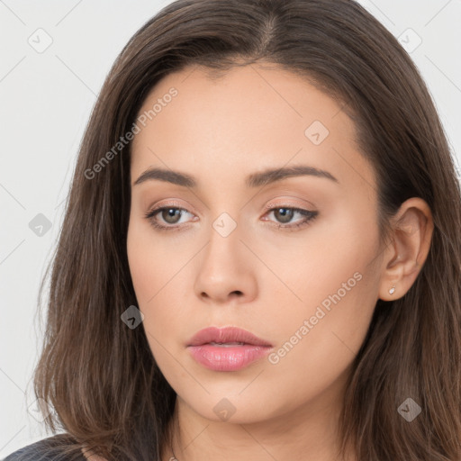 Neutral white young-adult female with long  brown hair and brown eyes