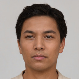 Neutral asian young-adult male with short  brown hair and brown eyes