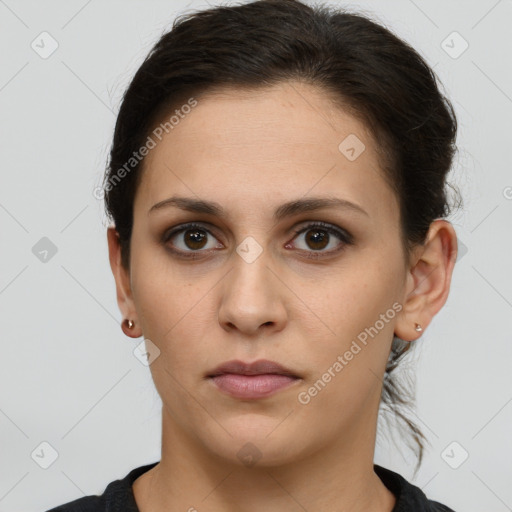 Neutral white young-adult female with short  brown hair and brown eyes