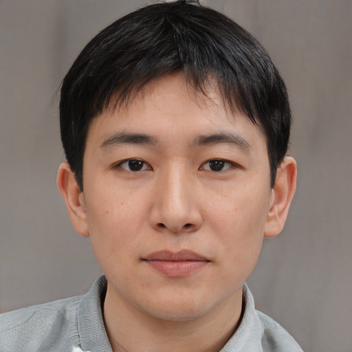 Neutral asian young-adult male with short  brown hair and brown eyes