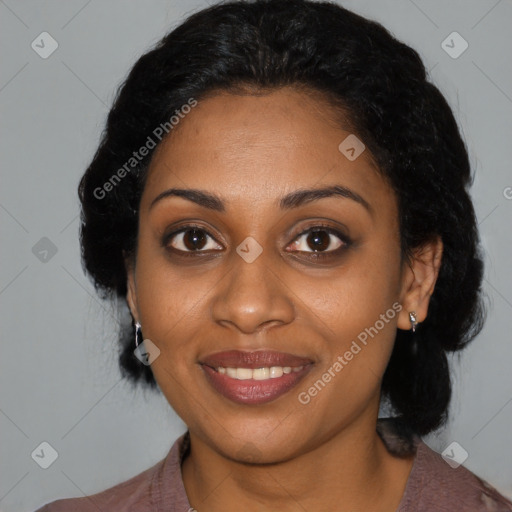 Joyful black young-adult female with medium  black hair and brown eyes