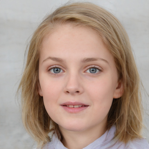 Joyful white child female with medium  brown hair and blue eyes