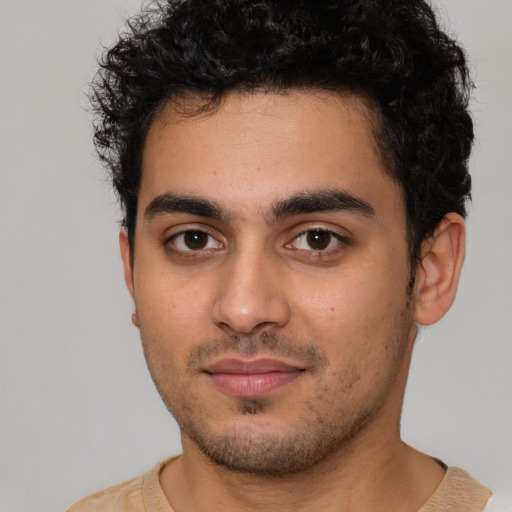 Neutral latino young-adult male with short  brown hair and brown eyes
