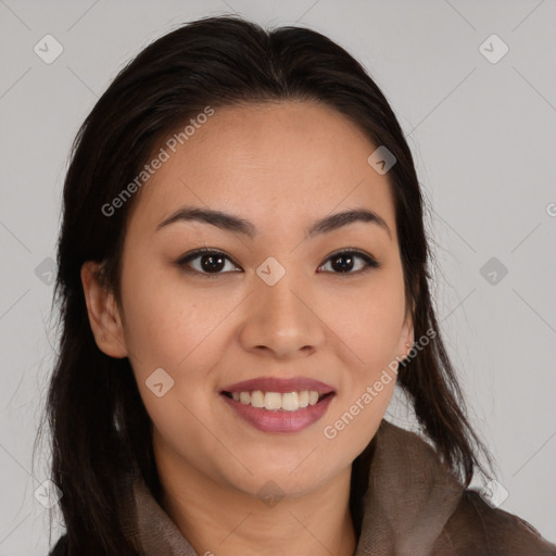 Joyful latino young-adult female with long  brown hair and brown eyes