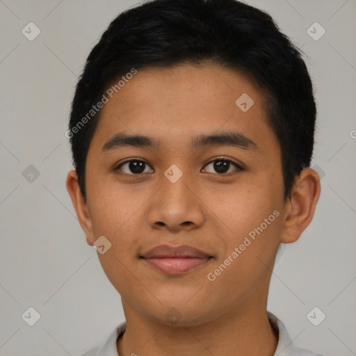 Joyful asian young-adult male with short  black hair and brown eyes