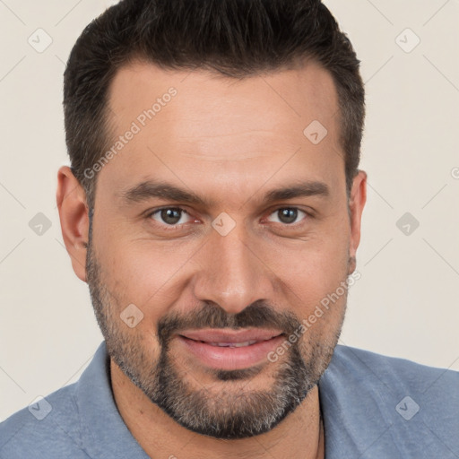 Joyful white adult male with short  brown hair and brown eyes