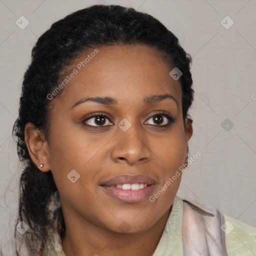 Joyful black young-adult female with medium  brown hair and brown eyes