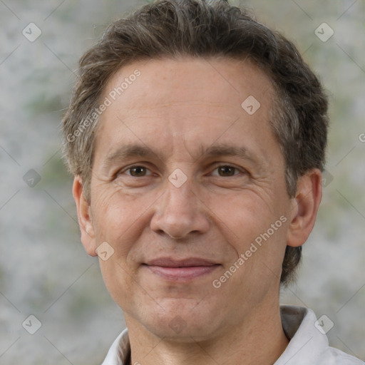 Joyful white middle-aged male with short  brown hair and brown eyes