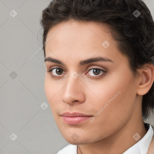 Neutral white young-adult female with short  brown hair and brown eyes