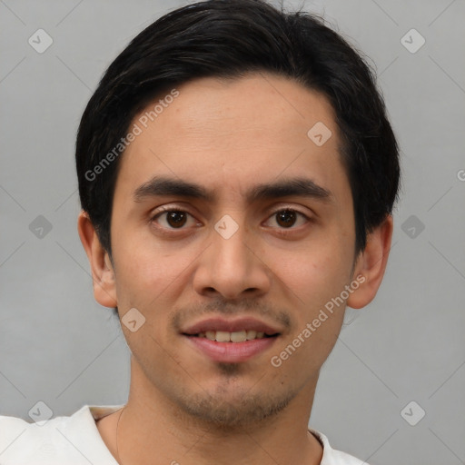 Joyful white young-adult male with short  black hair and brown eyes