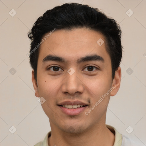 Joyful latino young-adult male with short  black hair and brown eyes