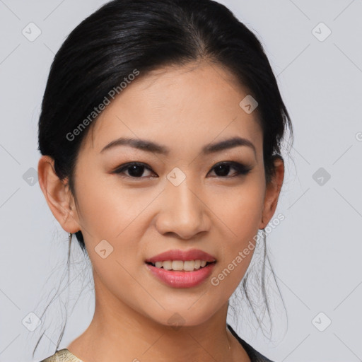 Joyful asian young-adult female with medium  black hair and brown eyes