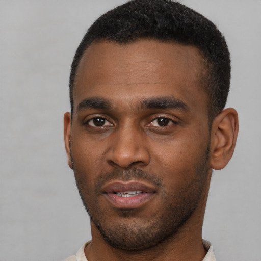Neutral black young-adult male with short  black hair and brown eyes