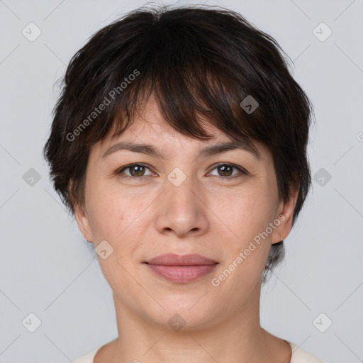 Joyful white adult female with medium  brown hair and brown eyes