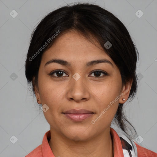 Joyful latino young-adult female with medium  brown hair and brown eyes