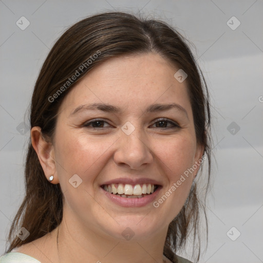 Joyful white young-adult female with medium  brown hair and grey eyes