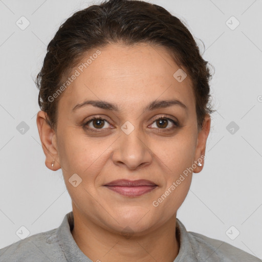 Joyful white adult female with short  brown hair and brown eyes