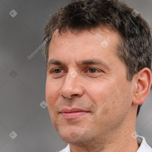 Neutral white adult male with short  brown hair and brown eyes