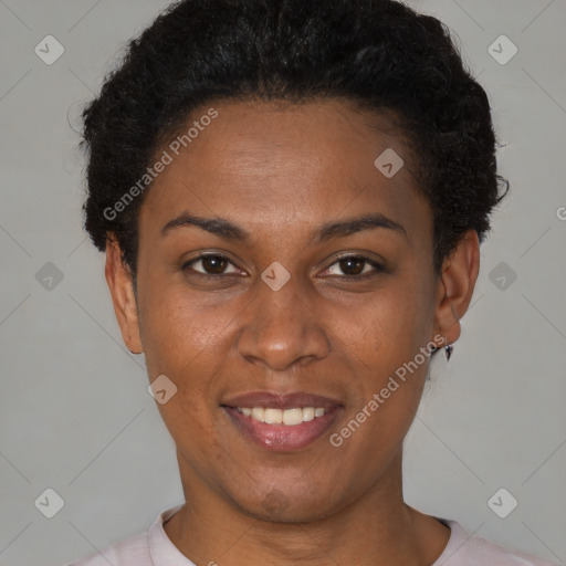 Joyful black young-adult female with short  brown hair and brown eyes