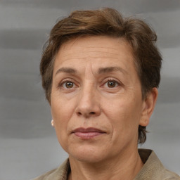 Joyful white adult female with short  brown hair and brown eyes