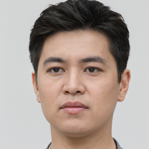 Neutral white young-adult male with short  black hair and brown eyes