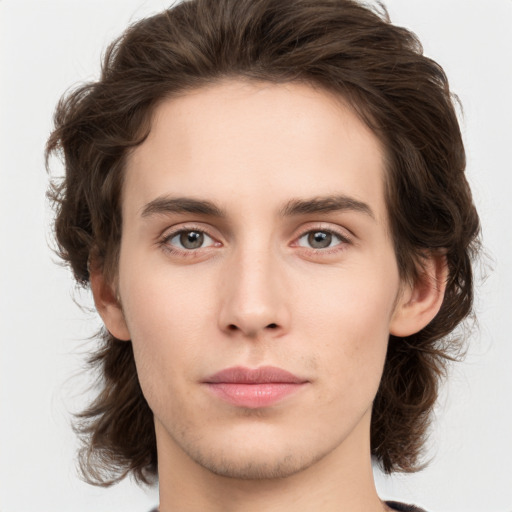 Neutral white young-adult male with medium  brown hair and brown eyes