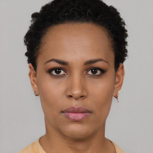 Neutral black young-adult female with short  black hair and brown eyes