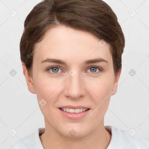 Joyful white young-adult female with short  brown hair and grey eyes