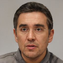 Neutral white adult male with short  brown hair and brown eyes