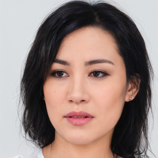 Neutral asian young-adult female with medium  black hair and brown eyes