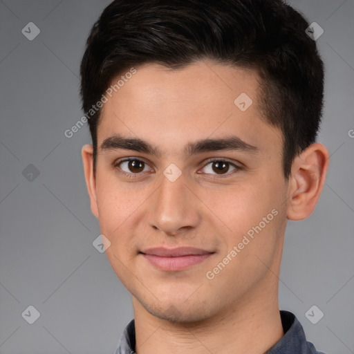 Joyful white young-adult male with short  brown hair and brown eyes