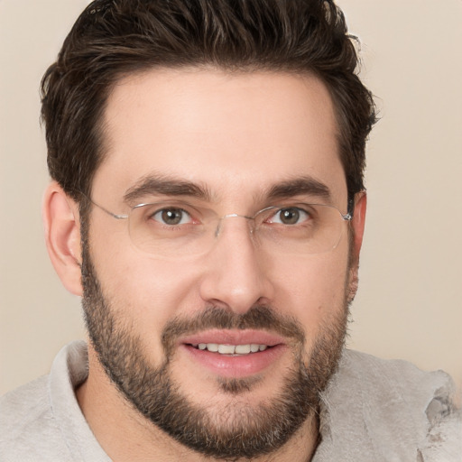 Joyful white young-adult male with short  brown hair and brown eyes