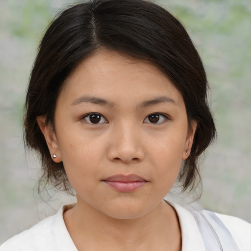 Neutral asian young-adult female with medium  brown hair and brown eyes