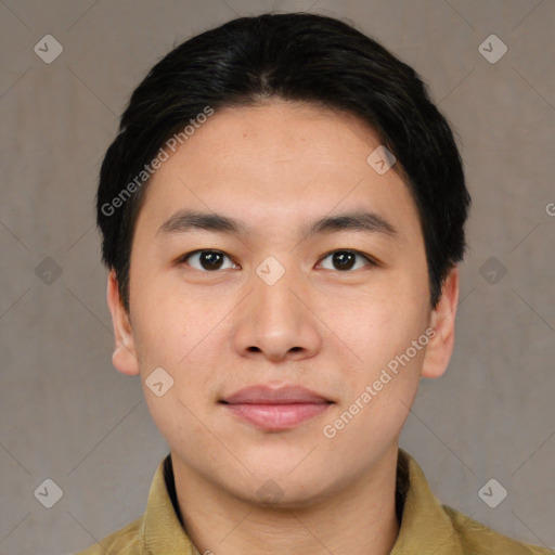 Joyful asian young-adult male with short  brown hair and brown eyes