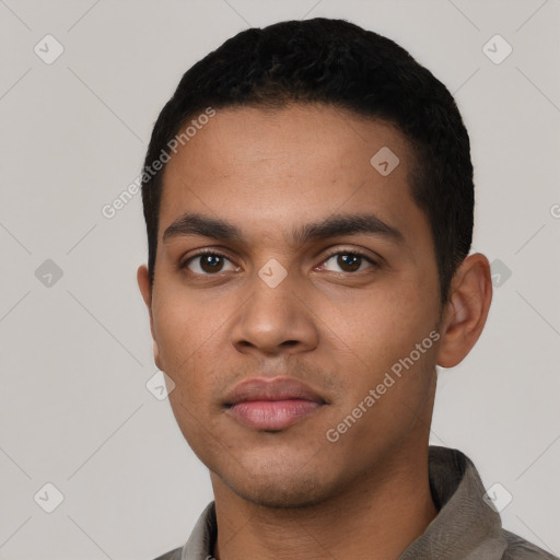 Neutral latino young-adult male with short  black hair and brown eyes