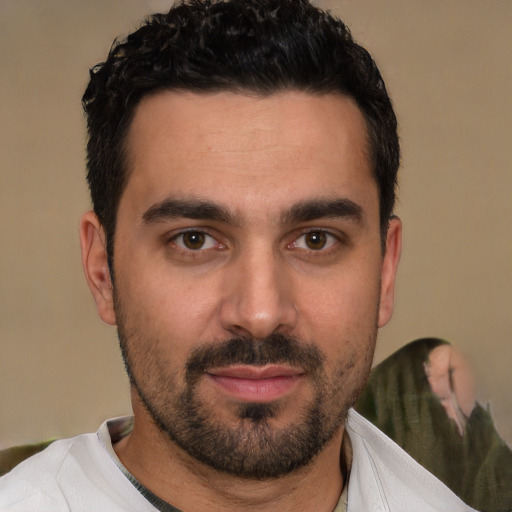 Neutral white young-adult male with short  black hair and brown eyes