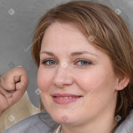 Joyful white young-adult female with medium  brown hair and blue eyes