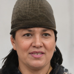 Joyful white adult female with short  brown hair and grey eyes