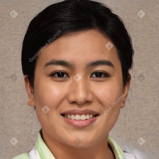 Joyful asian young-adult female with short  black hair and brown eyes