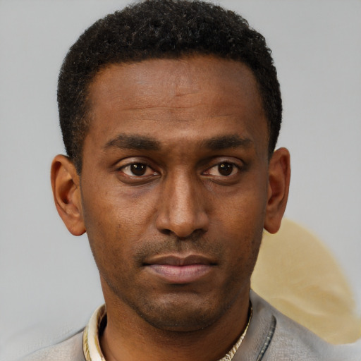Neutral black young-adult male with short  brown hair and brown eyes
